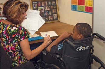 Woman Reading to Child